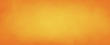 Yellow orange background with faint texture and distressed vintage grunge and watercolor paint stains in elegant Christmas backdrop illustration