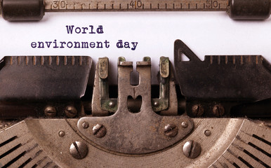 Wall Mural - World environment day, written on an old typewriter