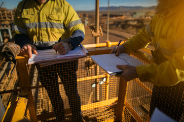 Wall Mural - construction miner workers are signing of the permit to work on the opening field prior starting ear