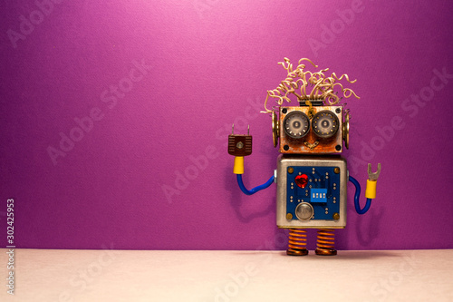 Cuadros en Lienzo Funny steampunk robotic toy on purple background