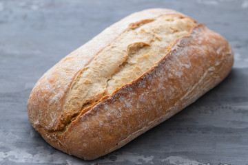 Poster - bread on gray ceramic background