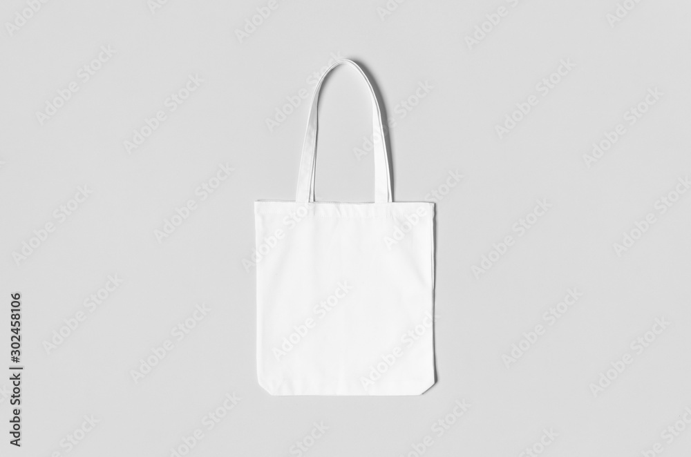 White tote bag mockup on a grey background. - obrazy, fototapety, plakaty 