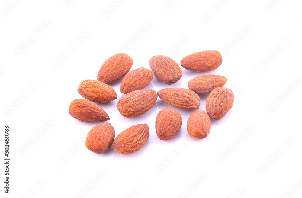 salted and roasted almonds on white background Stock Photo | Adobe Stock