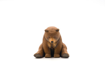  Brown bear statue In depression isolated on a white background