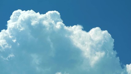 Wall Mural - pure heap white cloud moving by wind on the blue sky time lapse