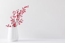 Winter Composition Of White Branches, Red Berries And Leaves With Sparkles In Vase On White Background. Christmas, New Year, Winter Concept. Front View, Copy Space