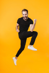 Poster - Full length image of caucasian man smiling and gesturing as winner