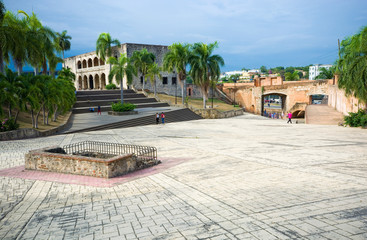 Wall Mural - View of Alcazar de Colon (Columbus Alcazar) and San Diego Gate at Plaza de Espana Square in colonial area of Santo Domingo city, Dominican Republic