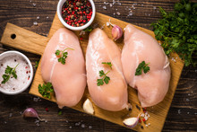 Chicken Fillet With Ingredients For Cooking On Wooden Table.