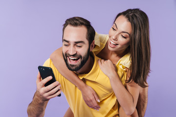 Canvas Print - Happy excited beautiful young couple