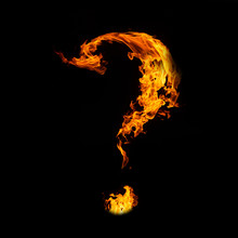 Question Mark From Fire On Black Background