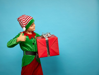 Boy  in Santa's elf costume