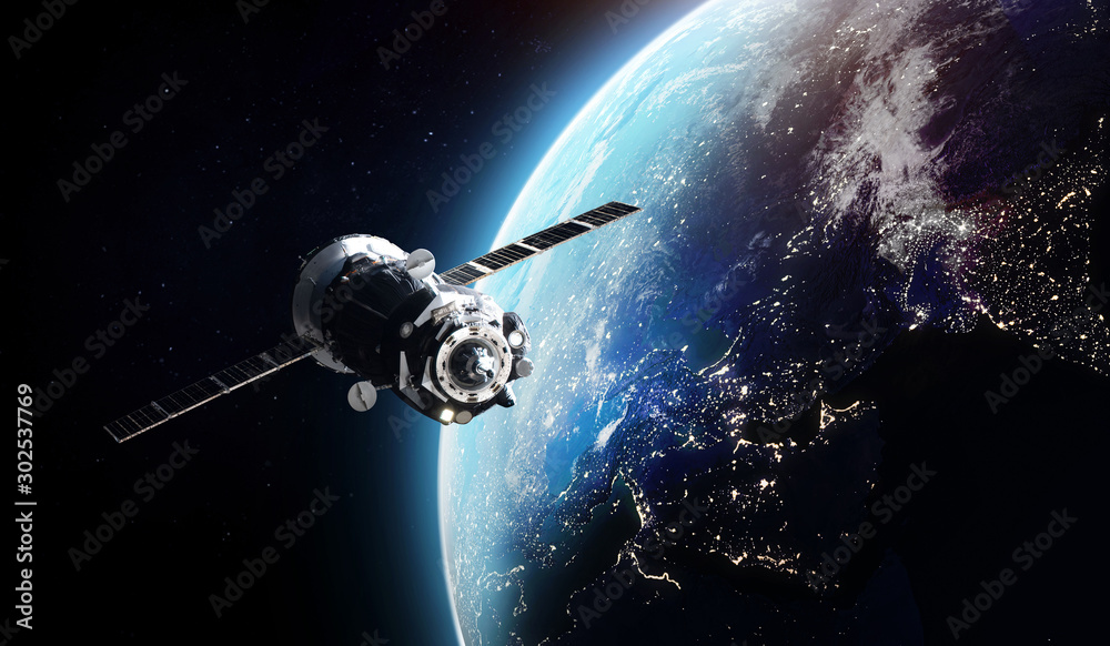 Cargo spaceship on orbit of the Earth planet. Dark space. Elements of this image furnished by NASA - obrazy, fototapety, plakaty 