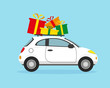 © Елена Истомина - White car with Christmas gifts on the roof.