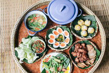 Set Of Local Food At Na Ton Chan Homestay,fried Fish With Tomato,corn,cucumber And Boil Vegetable  Si Satchanalai District, Sukhothai Province ,Thailand.on Khantoke Traditionally Meal Set Popular