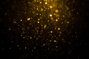 Abstract gold bokeh with black