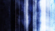 Abstract background. Vertical stripes. Blue texture background. Ceta gradations from light blue to deep indigo. Rough tinted paper texture