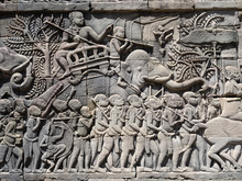 Close Up Of A Bas Relief With Warriors And An Elephant At Bayon Temple