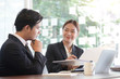 © wattana - Business working in office with documents and laptop people Consulting and business planning.