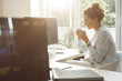 © LStockStudio - Businesswoman Working on a Desktop Computer