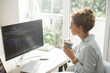 © LStockStudio - Businesswoman Working on a Desktop Computer