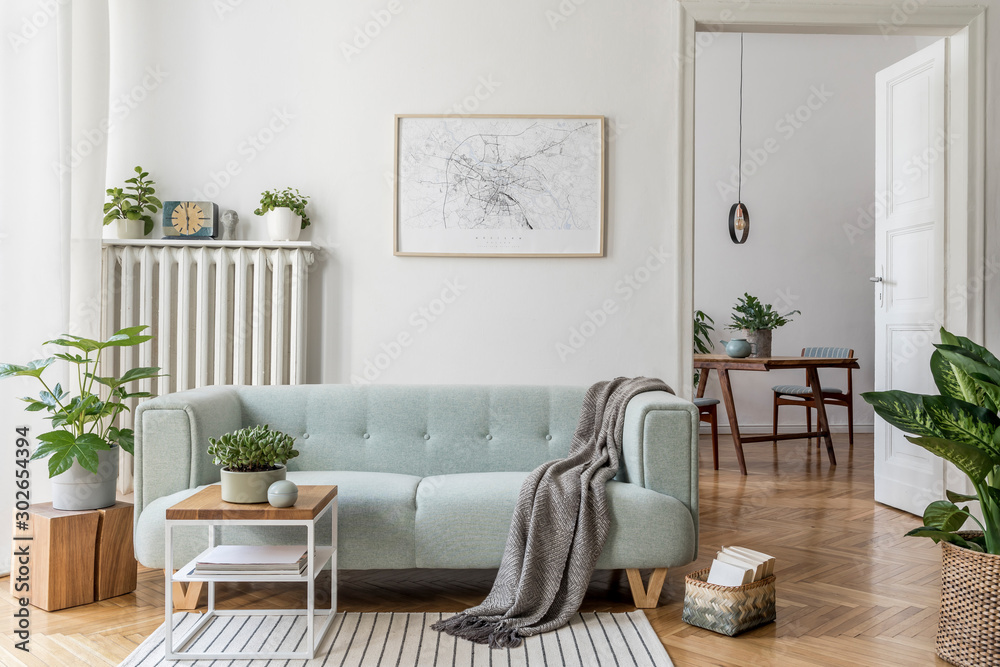Stylish scandinavian living room with design mint sofa, furnitures, mock up poster map, plants and elegant personal accessories. Modern home decor. Open space with dining room. Template Ready to use.  - obrazy, fototapety, plakaty 