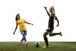 © master1305 - Young female soccer or football players with long hair in sportwear and boots training on white background. Concept of healthy lifestyle, professional sport, motion, movement. Fight for goal.