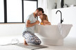 © New Africa - Father and his cute little daughter in bathroom