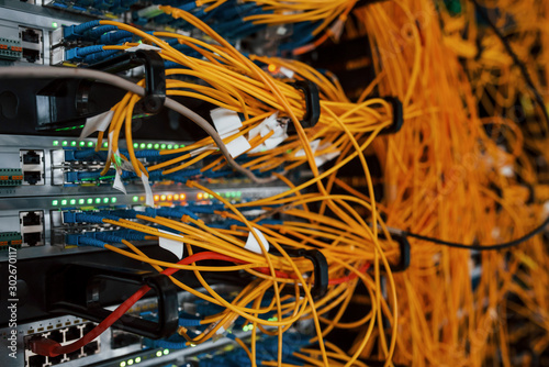 Cuadros en Lienzo Close up view of internet equipment and cables in the server room