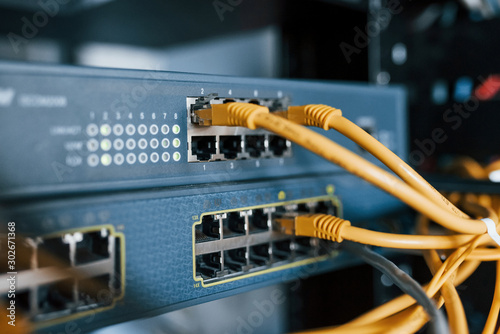 Fotomural Close up view of internet equipment and cables in the server room