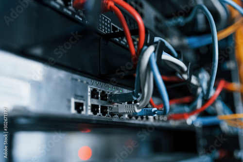 Cuadros en Lienzo Close up view of internet equipment and cables in the server room