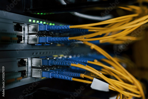 Fotomural Close up view of internet equipment and cables in the server room