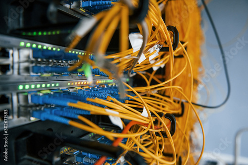 Fotografía Close up view of internet equipment and cables in the server room