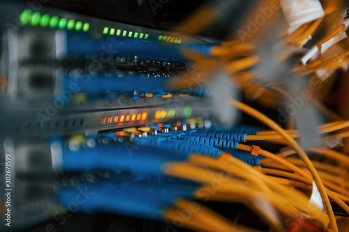 Fotografía Close up view of internet equipment and cables in the server room