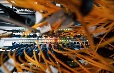 Close up view of internet equipment and cables in the server room