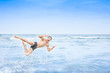 © Iván Moreno - man jumping happily into the water