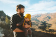 © EVERST - Father walking with baby daughter in mountains travel family adventure lifestyle vacations dad with child activity outdoor