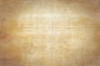 © Milovan - Brown light old rough paper background.