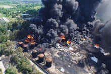 Oil Storage Fire. The Tank Farm Is Burning, Black Smoke Is Combu