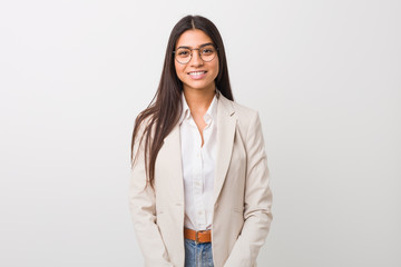young business arab woman isolated against a white background happy, smiling and cheerful.