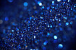 Imitation of the galaxy in endless space. Abstraction. Blue sparkling background with shallow depth of field. Magic and fiction