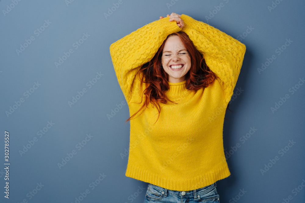 Cute charismatic young woman grinning happily - obrazy, fototapety, plakaty 