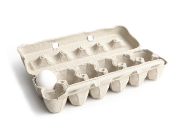 the last egg in an egg carton isolated on whit