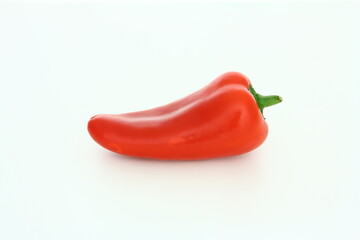 Wall Mural - Fresh vegetables - red sweet pepper on white background - healthy food