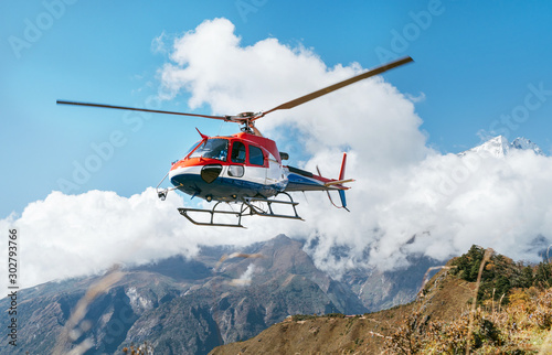 Fotomural Medical Rescue helicopter landing in high altitude Himalayas mountains