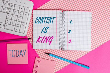 Poster - Handwriting text writing Content Is King. Conceptual photo words what sells products and provide good marketing Writing equipments and computer stuffs placed above colored plain table