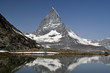 The Matterhorn on a clear summer day reflected in Riffelsee 