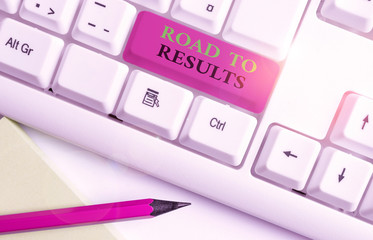 Writing note showing Road To Results. Business concept for Business direction Path Result Achievements Goals Progress White pc keyboard with note paper above the white background