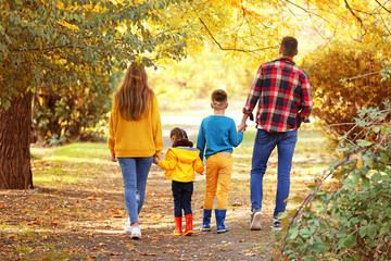 Poster - Happy family walking in autumn park