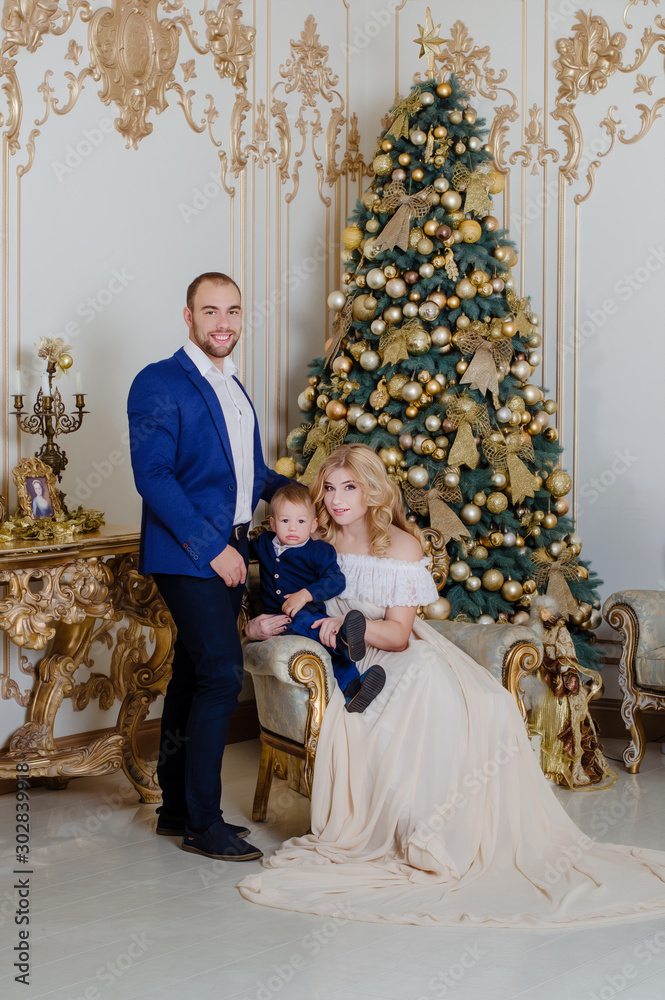 Christmas Couple. Happy Smiling Family at home celebrating New Year.New  year 2020.Mom in a
